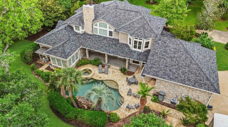 Luxurious home with pool and lush garden, perfect for buyers, listed by Realtor Broker Sugar Land.