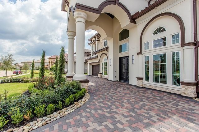 Detailed view of luxury entryway and columns on a Sugar Land property, showcasing features highlighted by house selling agents Sugar Land.
