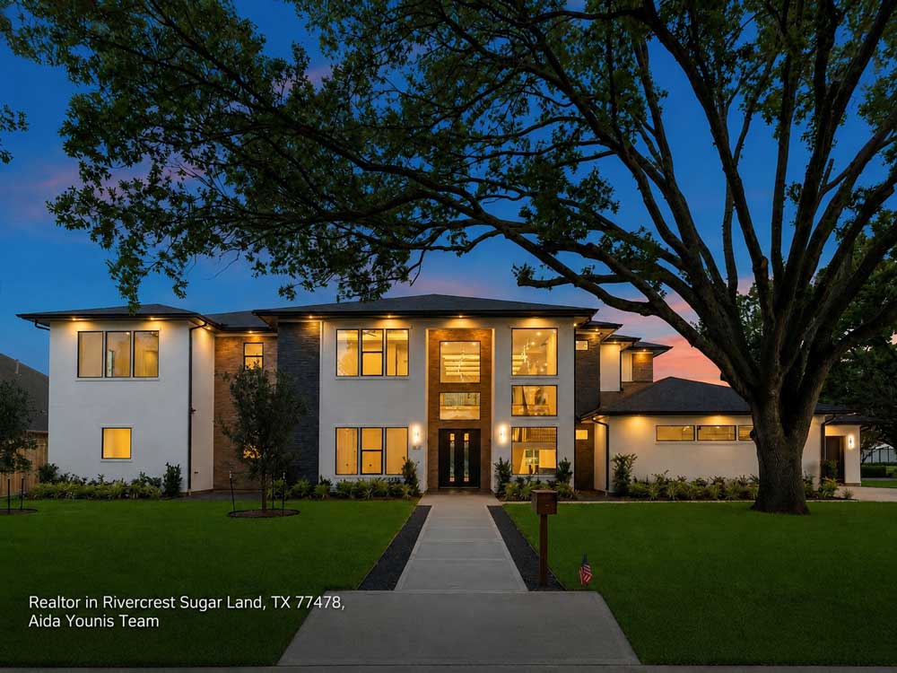 Stunning modern Rivercrest home framed by a gorgeous grand oak tree, represented by a top realtor Sugar Land team.